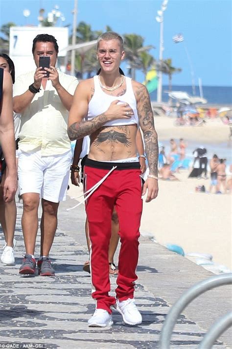 Photos Justin Bieber Struts Around Brazil While Showing Off New Tattoos And Washboard Abs