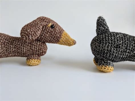 He is a fat little sausage dog whose legs are sticking out in front and behind him, just like my dog when he is fast asleep. Crochet sausage dog amigurumi Dachshund (With images ...