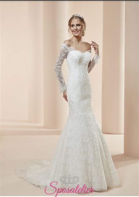 Abito da sposa in tulle con maniche lunghe ball gown allacciato naturale. flessia- abiti da sposa a sirena con maniche lunghe e schiena scopertaSposatelier