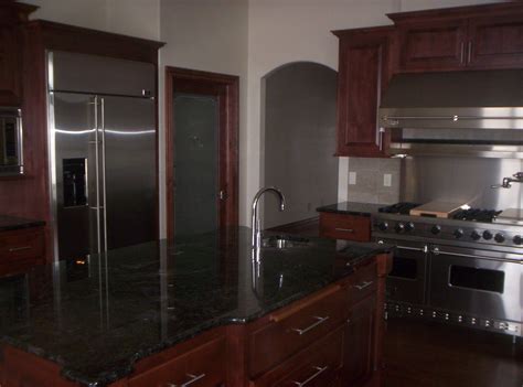 Find updated content daily for cabinets rta. Walnut Cabinets, stainless steel appliances, tiled back ...