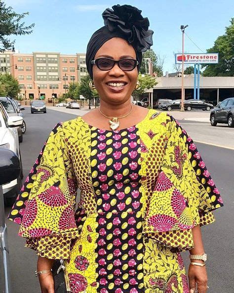 Le modèle en pagne du jour. Wide sleeves yellow fitting chitenge dress. Kanyget ...