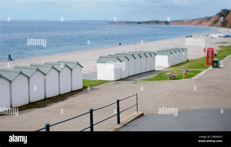 Colourful Wooden Beach Huts Along The Seafront At Budleigh Salterton Devon Taken On A Tilt