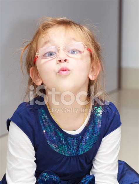 Portrait Little Girl Child Making Funny Face Doing Fun Stock Photo