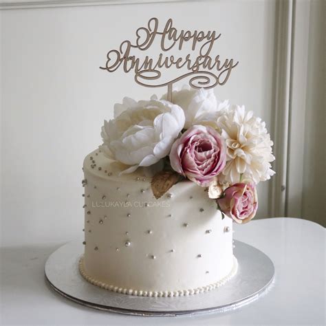 I found these just in time for my 50th birthday party. Flower cake | Happy anniversary cakes, Happy marriage ...