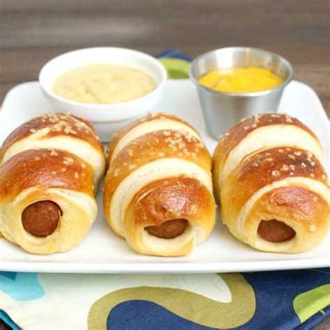 These hot dogs aren't that wild, but they are crazy delicious. Pretzel Dogs | Food, Hot dog recipes, Recipes