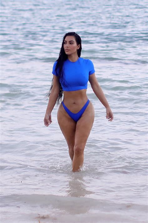 Kim Kardashian Shows Off Her Sensational Curves In A Blue Bikini During