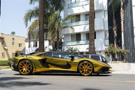 Lamborghini Aventador Appears Gorgeous With Golden Wrap And Black
