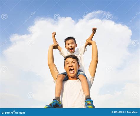 Happy Little Boy Sitting On Father S Shoulder Stock Photo Image Of