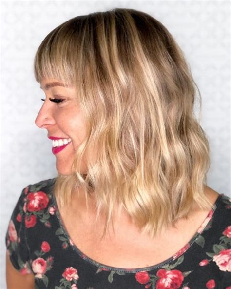 Seeing this haircut might result in making a spontaneous hair appointment. 53 Popular Medium Length Hairstyles With Bangs in 2020