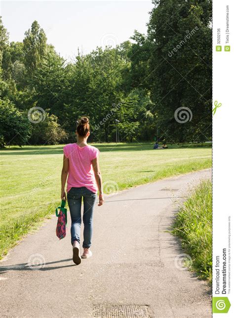 Beautiful Girl With Casual Look Walking Stock Photo Image Of Park