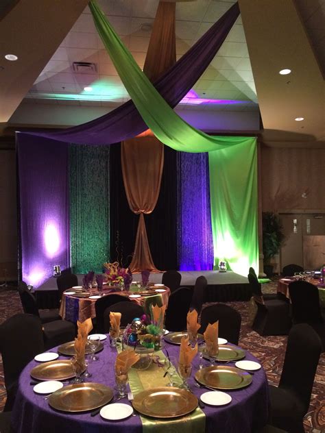 Mardi gras party room decorations hang paper lanterns in mardi gras colors. Mardi Gras Themed Ball #mardigras #theme #event #decor # ...