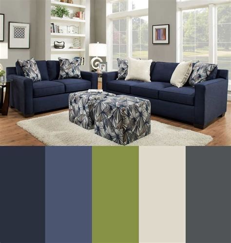 Colored living room sofa ideas combination. This warm color scheme of navy, blue, green, tan and ...