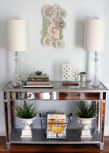 This solid wood console table stands out with its distinctive form and beautiful, hand distressed and polished mango wood construction. Mirrored Console Table - Eclectic - Entry - Houston - by ...