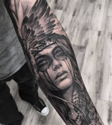 It all started as the feathers were a symbol of respect and also as an accomplishment gift to the courageous, by the chief of the tribe. Native American Woman Tattoo in Black and Grey on the ...