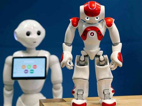 Softbank Robotics Robot Assistants Pepper L And Nao R Are Pictured