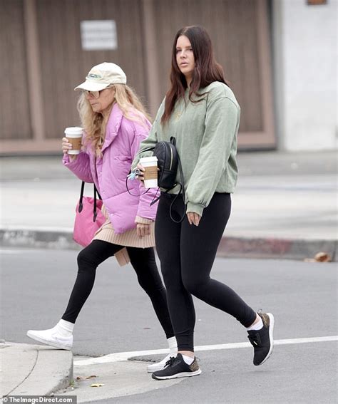 Lana Del Rey Cuts A Casual Figure In Leggings And A Green Sweater