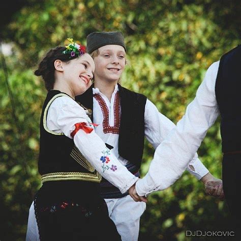 Children In Serbian National Costume Dancing Kolo A Serbian