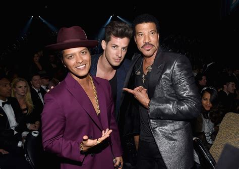 Alicia keys is actually only 1 inch taller than bruno, but some combination of high heels and high hair is really helping her out. Bruno Mars' Height, Girlfriend and Personal Style