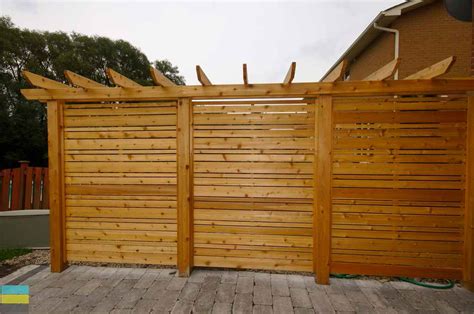 The existing deck on this house was previously painted and started to rot and also wasn't very stable. Interlocking patio, cedar privacy screen and pergola - M.E ...