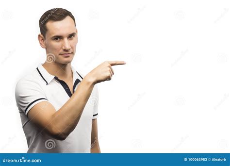 The Young Man Points A Finger Sideways Isolated On A White Stock Image