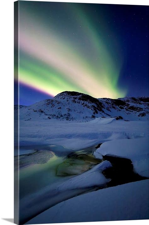 Aurora Borealis Over Mikkelfjellet Mountain In Troms County Norway