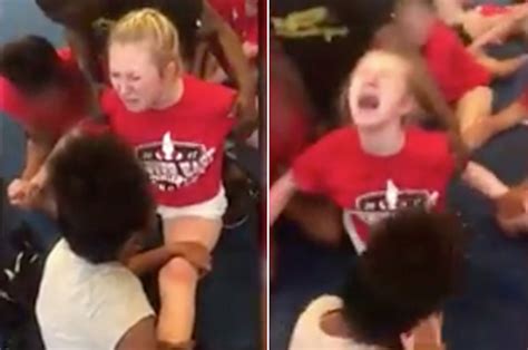 police are investigating this video of a teen cheerleader being forced to do splits all news mag