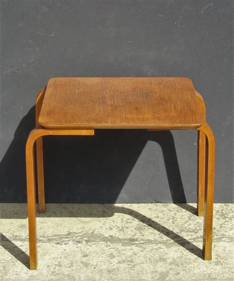 And the piece of plywood made the trek to utah. Bent Plywood and Teak Occasional Side Table - Made in Denmark - 1950 at 1stdibs