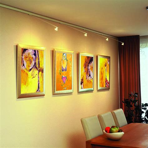 Arrange and rearrange them time and time again without using any tools, screws or nails! STAS multirail - picture hanging system with lighting ...