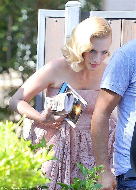 January Jones Sneaks In A Packet Of Cigarettes Before Working The Emmys