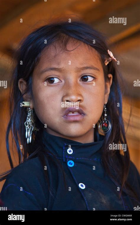 A Ann Tribal Girl In Traditional Dress In Her Village Near Kengtung