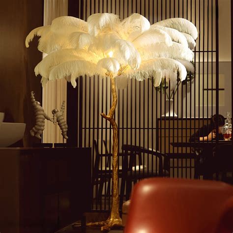 The aynhoe ostrich feather floor lamp is available in sixteen opulent hand… Hotel wedding bed room standing lighting feather floor copper lamp plume - Chandeliers, Ceiling ...