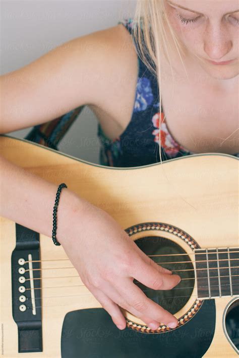 Girl Playing A Guitar By Stocksy Contributor Jacqui Miller Stocksy