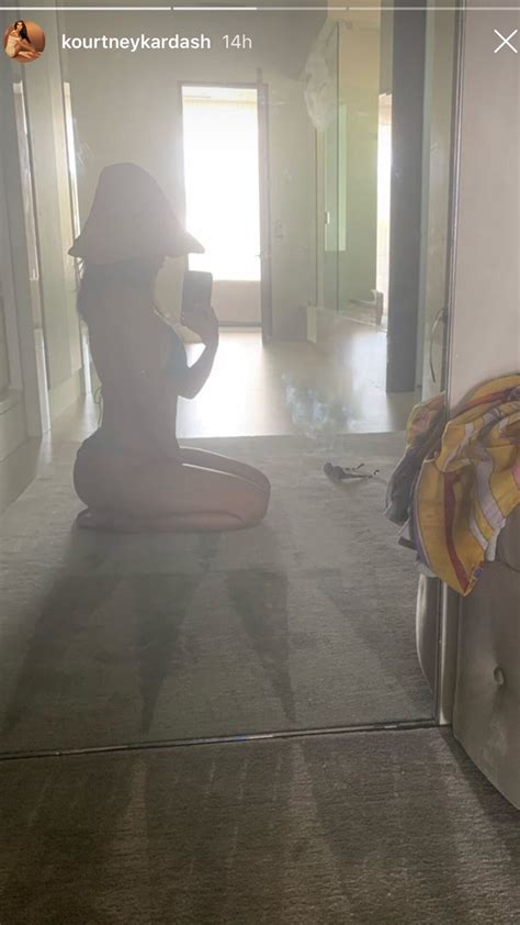 Kourtney Kardashian Snaps A Mirror Selfie While Wearing A Teal String