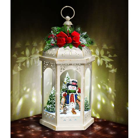 The Thomas Kinkade Illuminated Snowman Lantern Hammacher Schlemmer