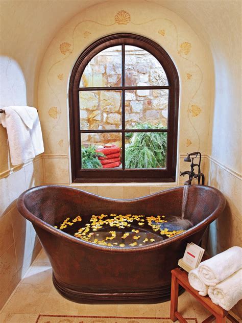 Single slipper japanise soaking copper bathtub. Mediterranean-Style Bathroom With Copper Soaking Tub | HGTV