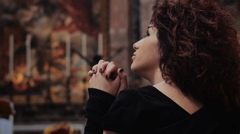 sad-and-depressed-woman-praying-in-the-church-feeling-alone-feeling-down_nqhyzcofl__F0000 ...