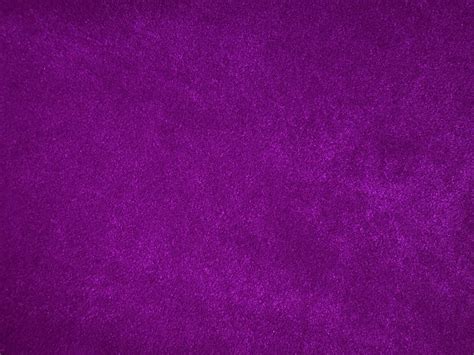 textura de tela de terciopelo morado oscuro utilizada como fondo fondo de tela púrpura vacío de