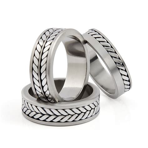 When you're shopping for your wedding band, you should try on options both with your ring and without, to make sure you love the look worn both if you're super active, go to the gym regularly, or use your hands for work, you may want to choose a more durable wedding band option to prevent. Titanium rings inlayed with precious white metals ...