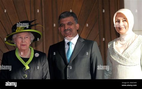 Queen Elizabeth II Is Welcomed By President Abdullah Gul And His Wife