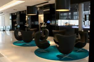 Hotel lobby furniture & sofa. Modern Hotel Lobby Furniture On Round Carpet And Sleek ...