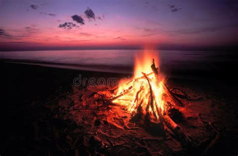 Beach Campfire On Lake Superior Blazing Campfire At Sunset Along The