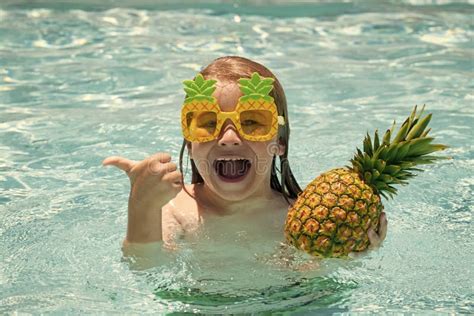 Happy Child Playing In Swimming Pool Summer Kids Vacation Stock Image