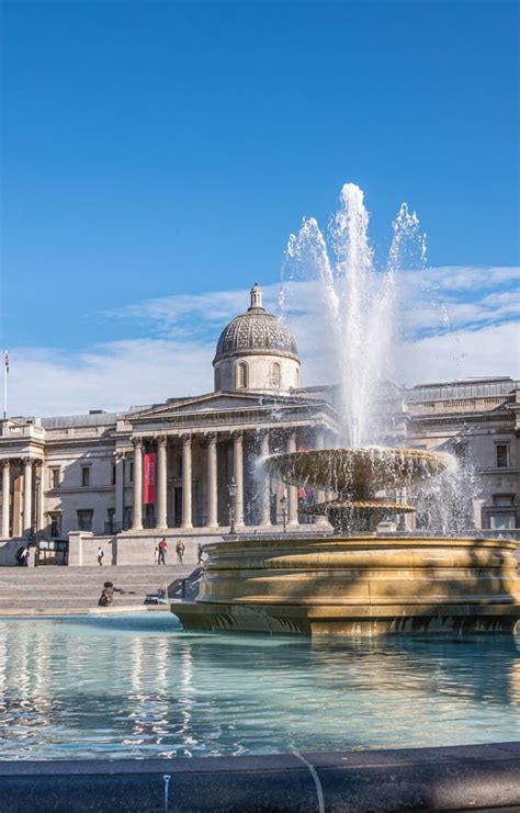 Fountain In Front Of National Gallery On Trafalgar Square London Uk