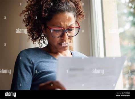 Portrait Of Worried Black Woman Standing Beside Window Stock Photo Alamy
