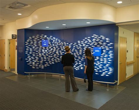 zebrafish-interactive-donor-wall-by-hypersonic-architizer