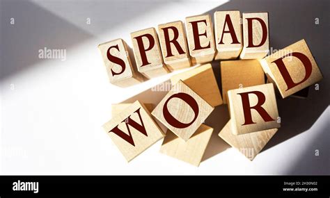 Spread The Word Written On A Wooden Block Spread Word Text On White