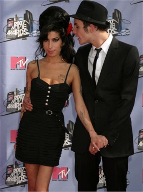 Amy Winehouse S Dresses Stolen Prior To Charity Auction TheFashionSpot