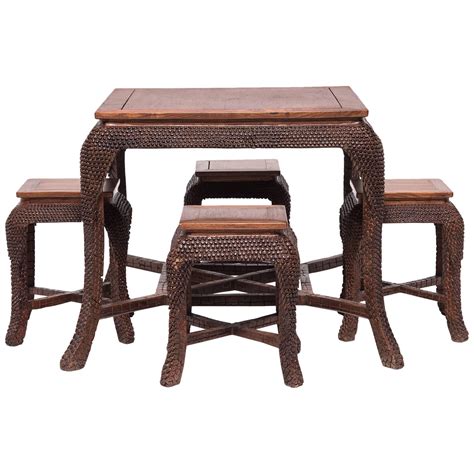 Round Chinese Carved Rosewood Tea Table With Nesting Stools At 1stdibs