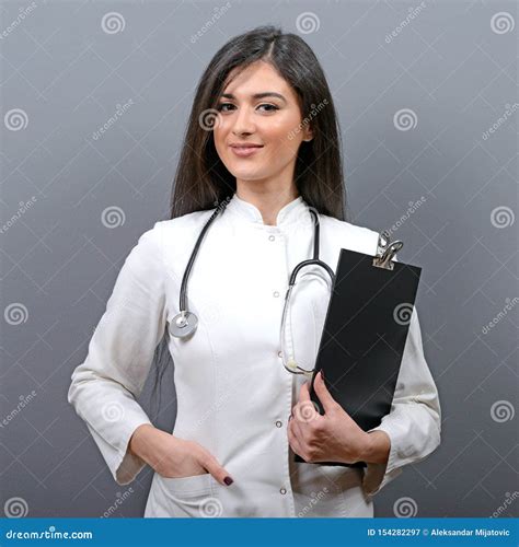 Portrait Of Confident Medical Doctor Woman With Stethoscope Against
