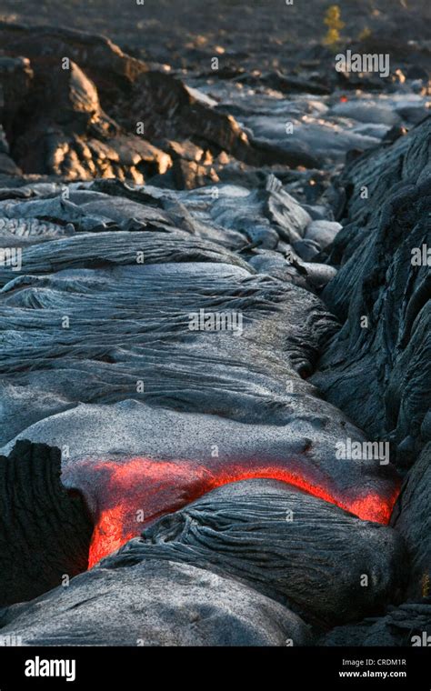 Molten Lava Rock Glows From Hi Res Stock Photography And Images Alamy